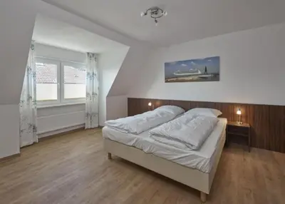 Ein Bett oder Betten in einem Zimmer der Unterkunft Op de Geest 16