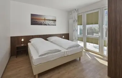 Ein Bett oder Betten in einem Zimmer der Unterkunft Op de Geest 06