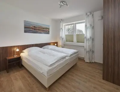 Ein Bett oder Betten in einem Zimmer der Unterkunft Op de Geest 07