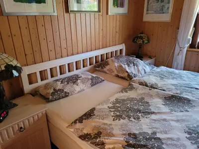 Ein Bett oder Betten in einem Zimmer der Unterkunft Ferienhaus Lefering Stiftung