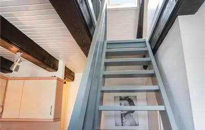 Ein Etagenbett oder Etagenbetten in einem Zimmer der Unterkunft Beautiful Apartment In Friedrichskoog Ot Frie