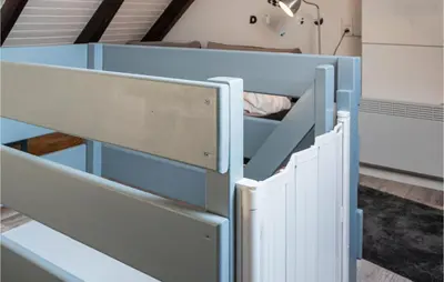 Ein Bett oder Betten in einem Zimmer der Unterkunft Beautiful Apartment In Friedrichskoog Ot Frie