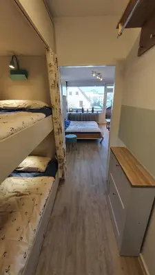 Ein Bett oder Betten in einem Zimmer der Unterkunft Duhner Meerblick