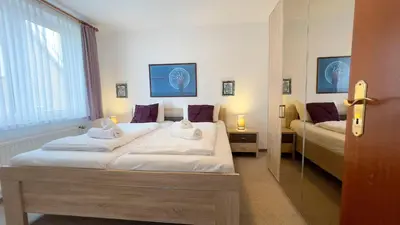 Ein Bett oder Betten in einem Zimmer der Unterkunft Haus Nordseeperle Fewo Nr. 4