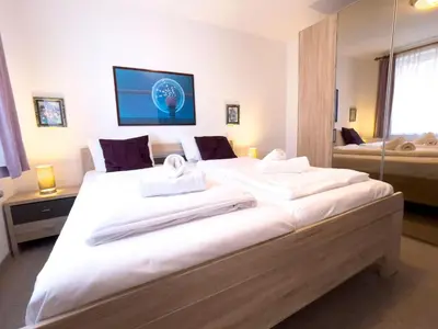 Ein Bett oder Betten in einem Zimmer der Unterkunft Haus Nordseeperle Fewo Nr. 4