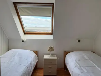 Ein Bett oder Betten in einem Zimmer der Unterkunft Meeresbrandung, Ferienwohnung 55