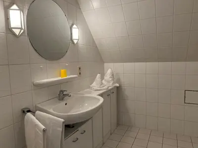 Ein Badezimmer in der Unterkunft Meeresbrandung, Ferienwohnung 55