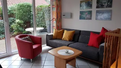 Ein Sitzbereich in der Unterkunft Ferienwohnung Nordsee