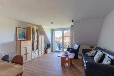 Ein Sitzbereich in der Unterkunft Haus Stranddüne, Whg 6