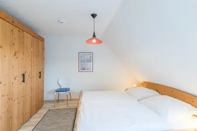 Ein Bett oder Betten in einem Zimmer der Unterkunft Haus Stranddüne, Whg 6