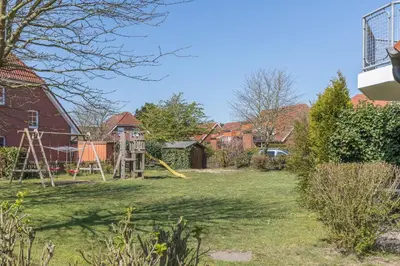 Ein Garten an der Unterkunft Haus Stranddüne, Whg 6