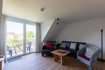 Ein Sitzbereich in der Unterkunft Haus Stranddüne, Whg 6