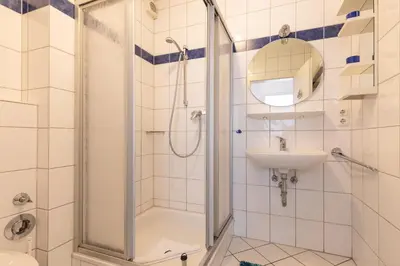 Ein Badezimmer in der Unterkunft Haus Weisse Möwe, Whg 2