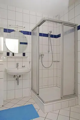 Ein Badezimmer in der Unterkunft Haus Weisse Möwe, Whg 3