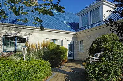 Ein Garten an der Unterkunft Haus Weisse Möwe, Whg 3