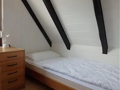 Ein Bett oder Betten in einem Zimmer der Unterkunft Nordstern
