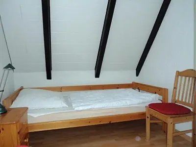 Ein Bett oder Betten in einem Zimmer der Unterkunft Nordstern
