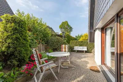 Ein Garten an der Unterkunft Nordseewelle