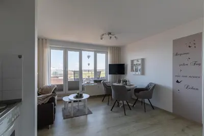 Ein Sitzbereich in der Unterkunft Haus Knechtsand, Whg 451