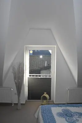 Ein Bett oder Betten in einem Zimmer der Unterkunft Wohnung 