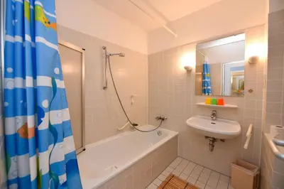 Ein Badezimmer in der Unterkunft 
