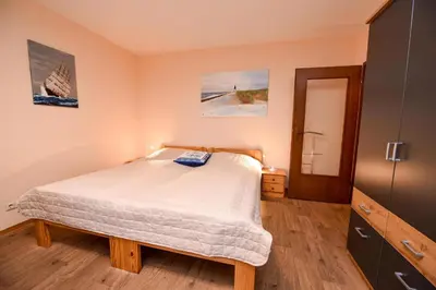 Ein Bett oder Betten in einem Zimmer der Unterkunft Haus 