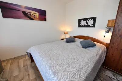 Ein Bett oder Betten in einem Zimmer der Unterkunft Haus 