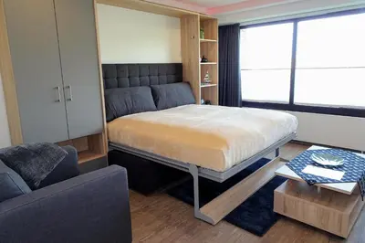 Ein Bett oder Betten in einem Zimmer der Unterkunft Haus 
