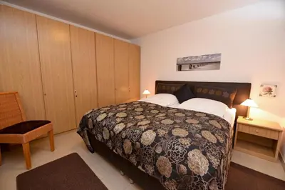Ein Bett oder Betten in einem Zimmer der Unterkunft Haus 