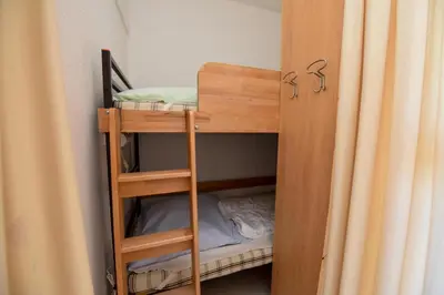 Ein Etagenbett oder Etagenbetten in einem Zimmer der Unterkunft Haus 