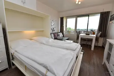 Ein Bett oder Betten in einem Zimmer der Unterkunft Haus 