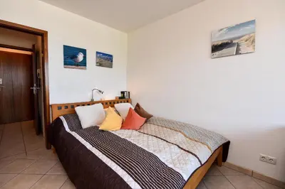 Ein Bett oder Betten in einem Zimmer der Unterkunft Haus 