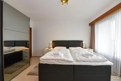 Ein Bett oder Betten in einem Zimmer der Unterkunft Haus 