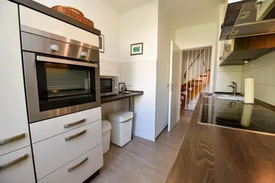Küche/Küchenzeile in der Unterkunft Kapitäns-Hus KH01