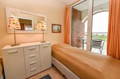 Ein Bett oder Betten in einem Zimmer der Unterkunft 