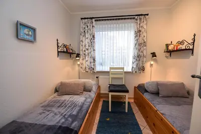Ein Bett oder Betten in einem Zimmer der Unterkunft Haus 
