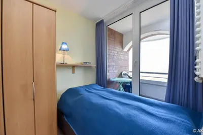 Ein Bett oder Betten in einem Zimmer der Unterkunft 