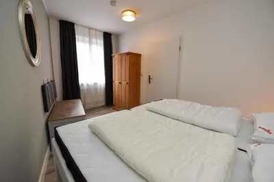 Ein Bett oder Betten in einem Zimmer der Unterkunft 