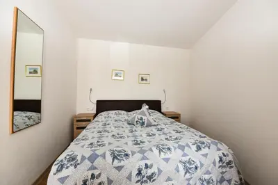 Ein Bett oder Betten in einem Zimmer der Unterkunft 
