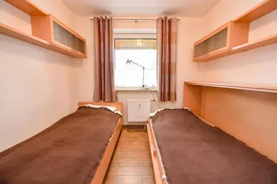 Ein Bett oder Betten in einem Zimmer der Unterkunft Haus 