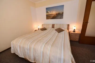 Ein Bett oder Betten in einem Zimmer der Unterkunft Haus 