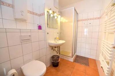 Ein Badezimmer in der Unterkunft Haus 