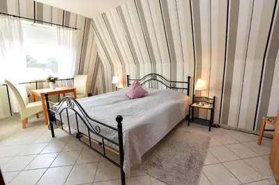 Ein Bett oder Betten in einem Zimmer der Unterkunft Haus 