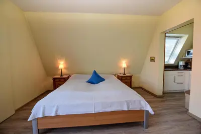Ein Bett oder Betten in einem Zimmer der Unterkunft Haus 