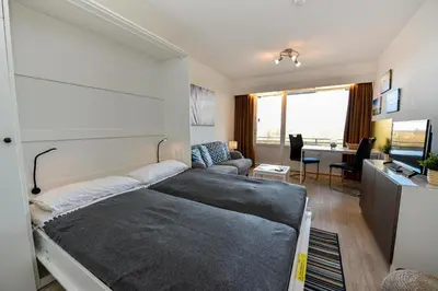 Ein Bett oder Betten in einem Zimmer der Unterkunft Haus 