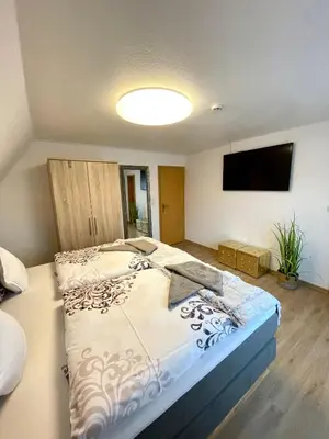 Ein Bett oder Betten in einem Zimmer der Unterkunft Haus Nordseeschatz Appartement 14 Sonnendeck