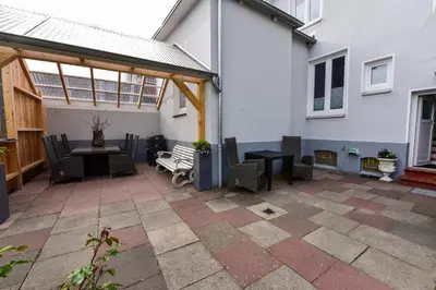 Ein Balkon oder eine Terrasse in der Unterkunft 