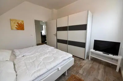 Ein Bett oder Betten in einem Zimmer der Unterkunft 