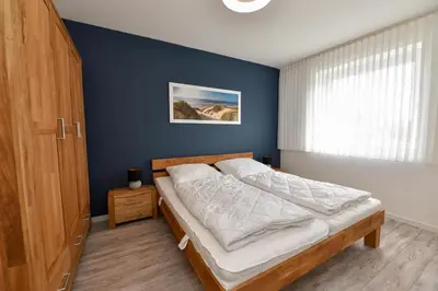 Ein Bett oder Betten in einem Zimmer der Unterkunft Haus 