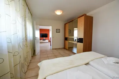 Ein Bett oder Betten in einem Zimmer der Unterkunft Haus 